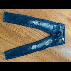 Ripped skinny jeans,kind of elastic